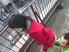 ここにホットアジアの屋外フェラチオ