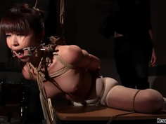 Bound gagged Asian fucked in dark